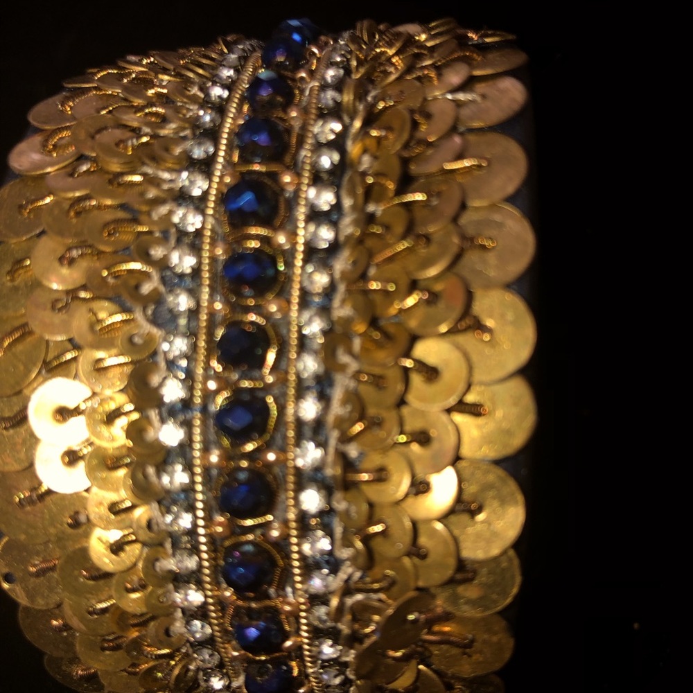 Women cuff bracelet adjustable stay in place because of the rigid metal